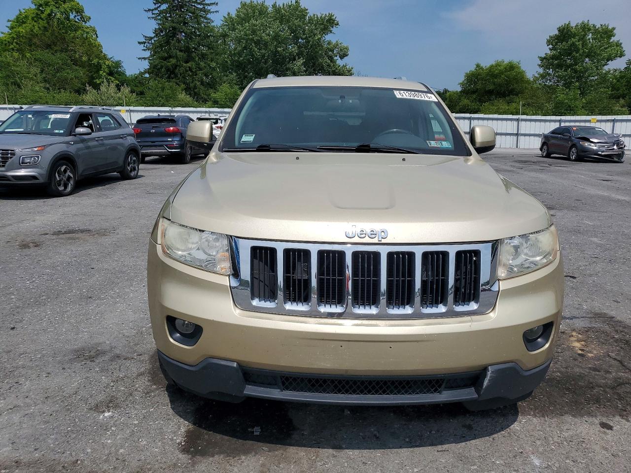 2011 Jeep Grand Cherokee Sport Gold vin: 1J4RR4GG6BC567056
