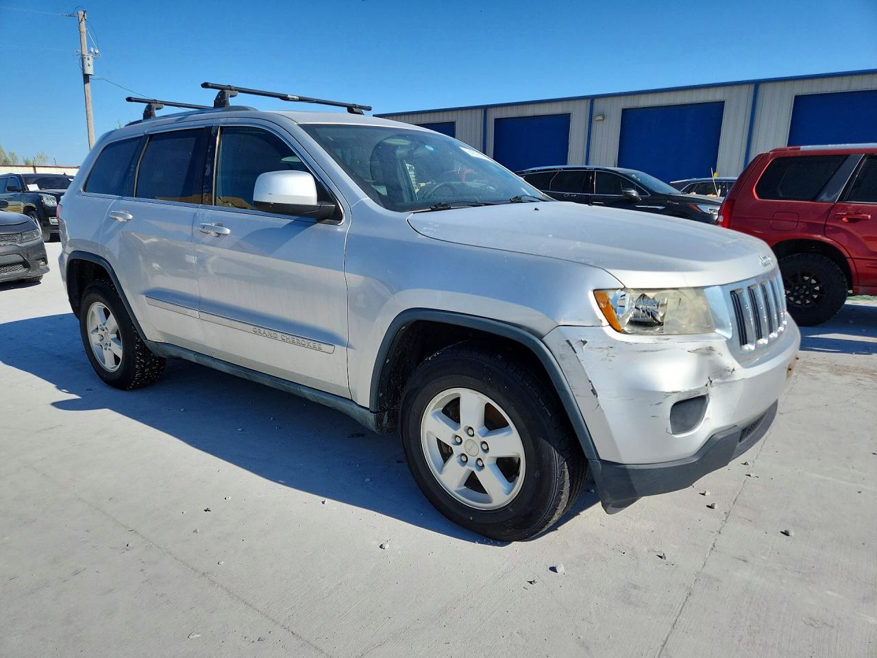 2011 Jeep Grand Cherokee Laredo Серебряный vin: 1J4RR4GG7BC553117