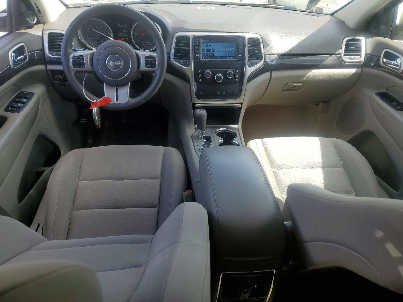 2011 Jeep Grand Cherokee Laredo Желто-коричневый vin: 1J4RR4GG7BC601151