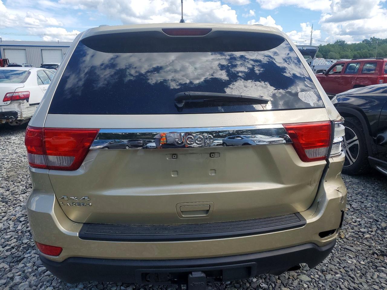 2011 Jeep Grand Cherokee Laredo Желто-коричневый vin: 1J4RR4GG7BC601151