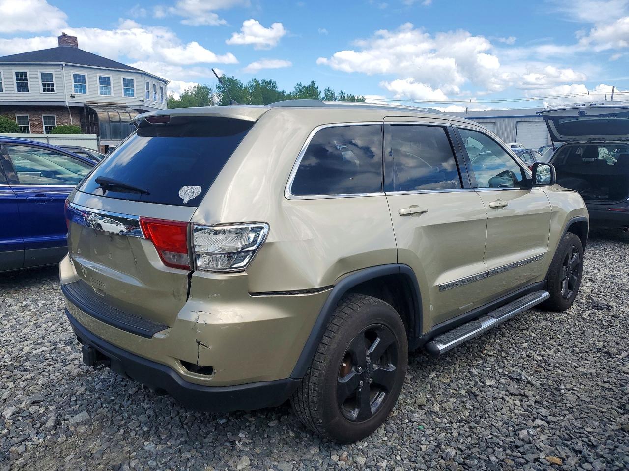 2011 Jeep Grand Cherokee Laredo Желто-коричневый vin: 1J4RR4GG7BC601151