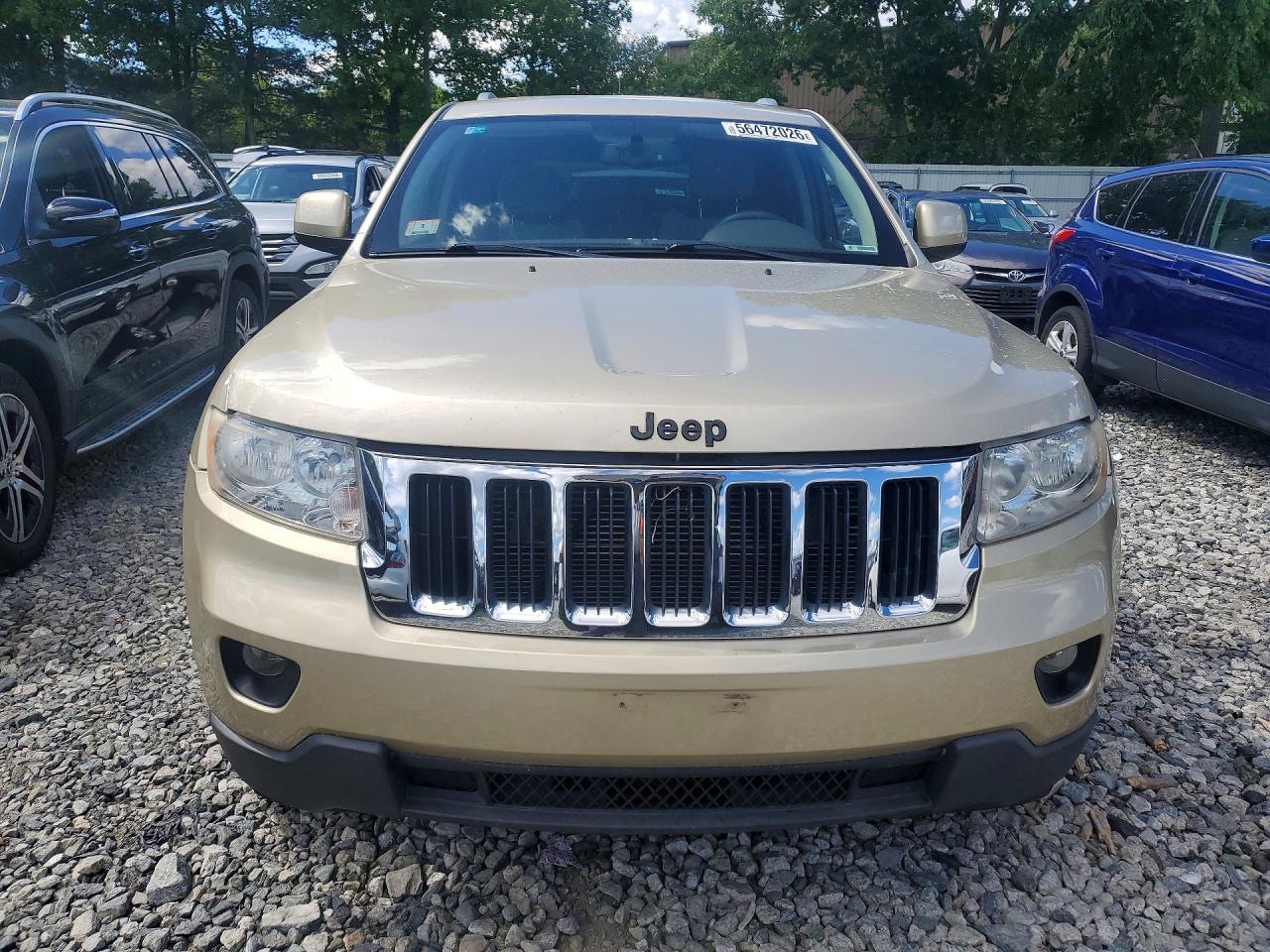 2011 Jeep Grand Cherokee Laredo Желто-коричневый vin: 1J4RR4GG7BC601151