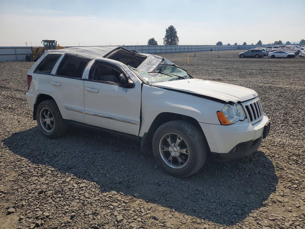 2010 Jeep Grand Cherokee Laredo Белый vin: 1J4RR4GT8AC151053