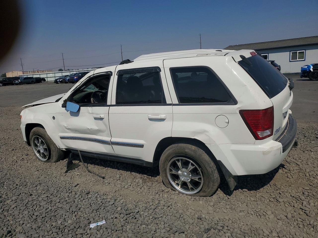 2010 Jeep Grand Cherokee Laredo Белый vin: 1J4RR4GT8AC151053