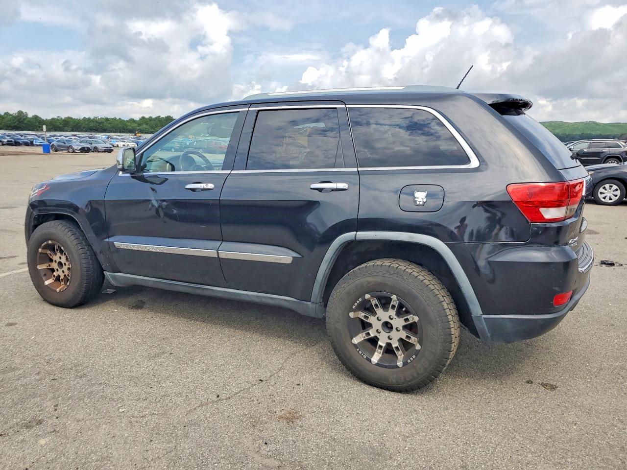 2011 Jeep Grand Cherokee Limited Черный vin: 1J4RR5GG1BC552096