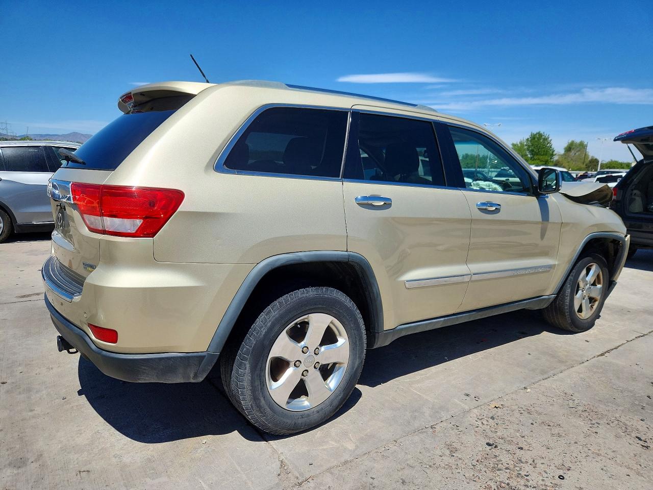 2011 Jeep Grand Cherokee Limited Tan vin: 1J4RR5GG5BC690479