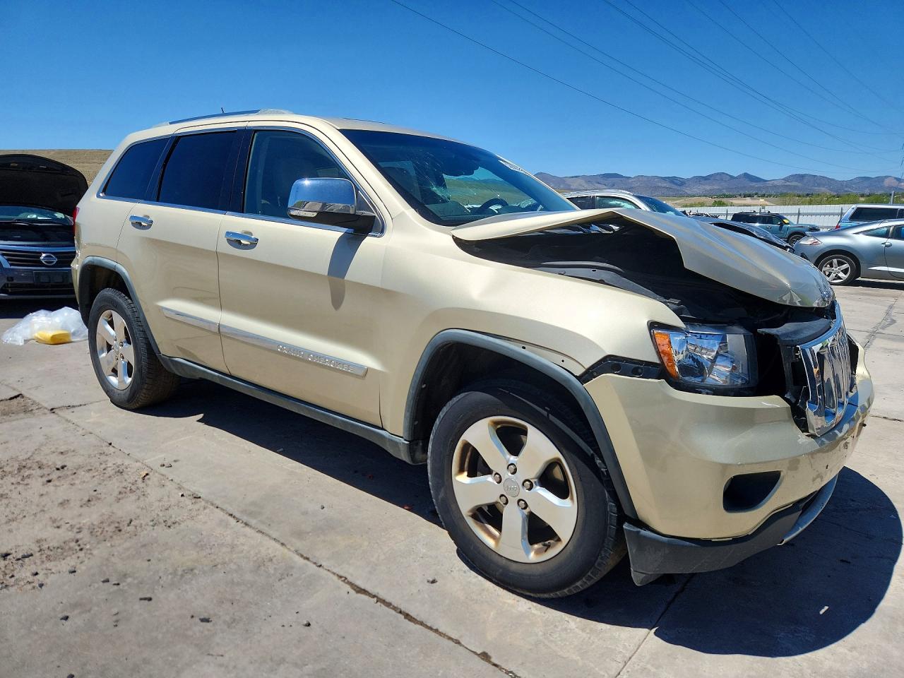 2011 Jeep Grand Cherokee Limited Tan vin: 1J4RR5GG5BC690479