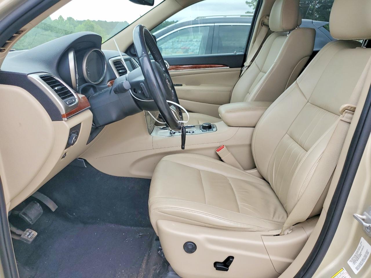 2011 Jeep Grand Cherokee Limited Золотой vin: 1J4RR5GT9BC578166