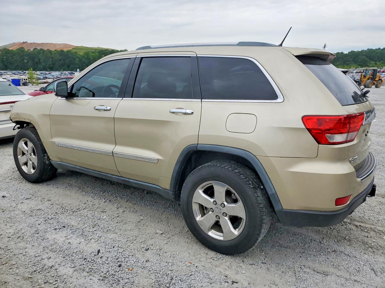2011 Jeep Grand Cherokee Limited Золотой vin: 1J4RR5GT9BC578166