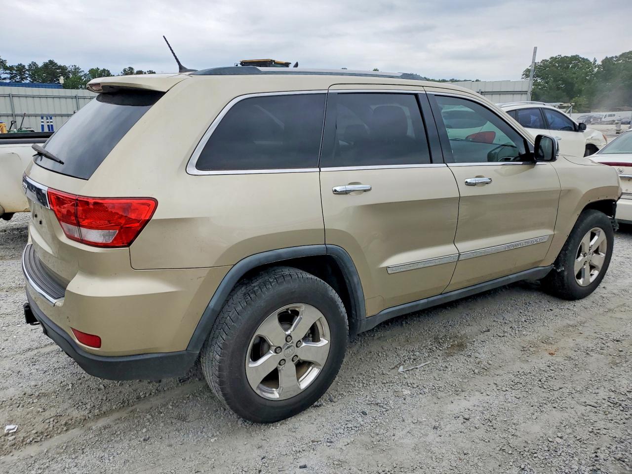 2011 Jeep Grand Cherokee Limited Золотой vin: 1J4RR5GT9BC578166