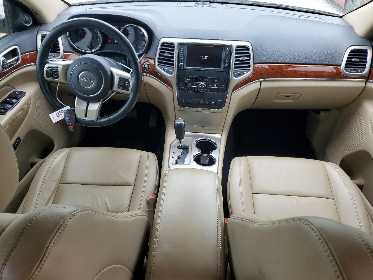 2011 Jeep Grand Cherokee Limited Золотой vin: 1J4RR5GT9BC578166