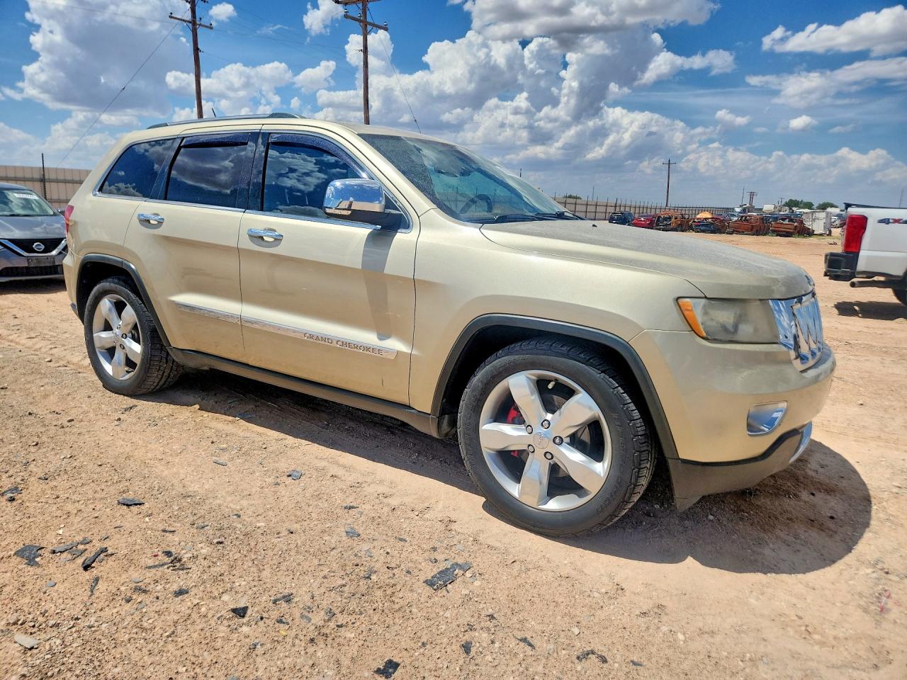 2011 Jeep Grand Cherokee Overland Gold vin: 1J4RR6GG7BC632962