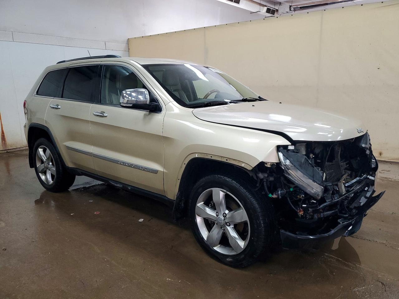 2011 Jeep Grand Cherokee Overland Золотой vin: 1J4RR6GG9BC557942