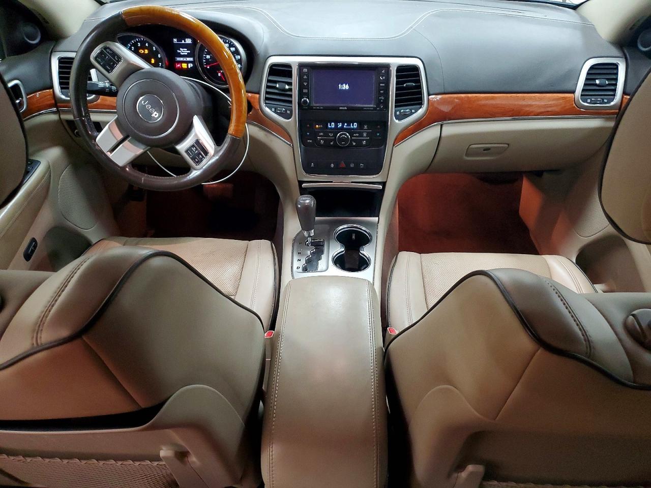2011 Jeep Grand Cherokee Overland Золотой vin: 1J4RR6GG9BC557942