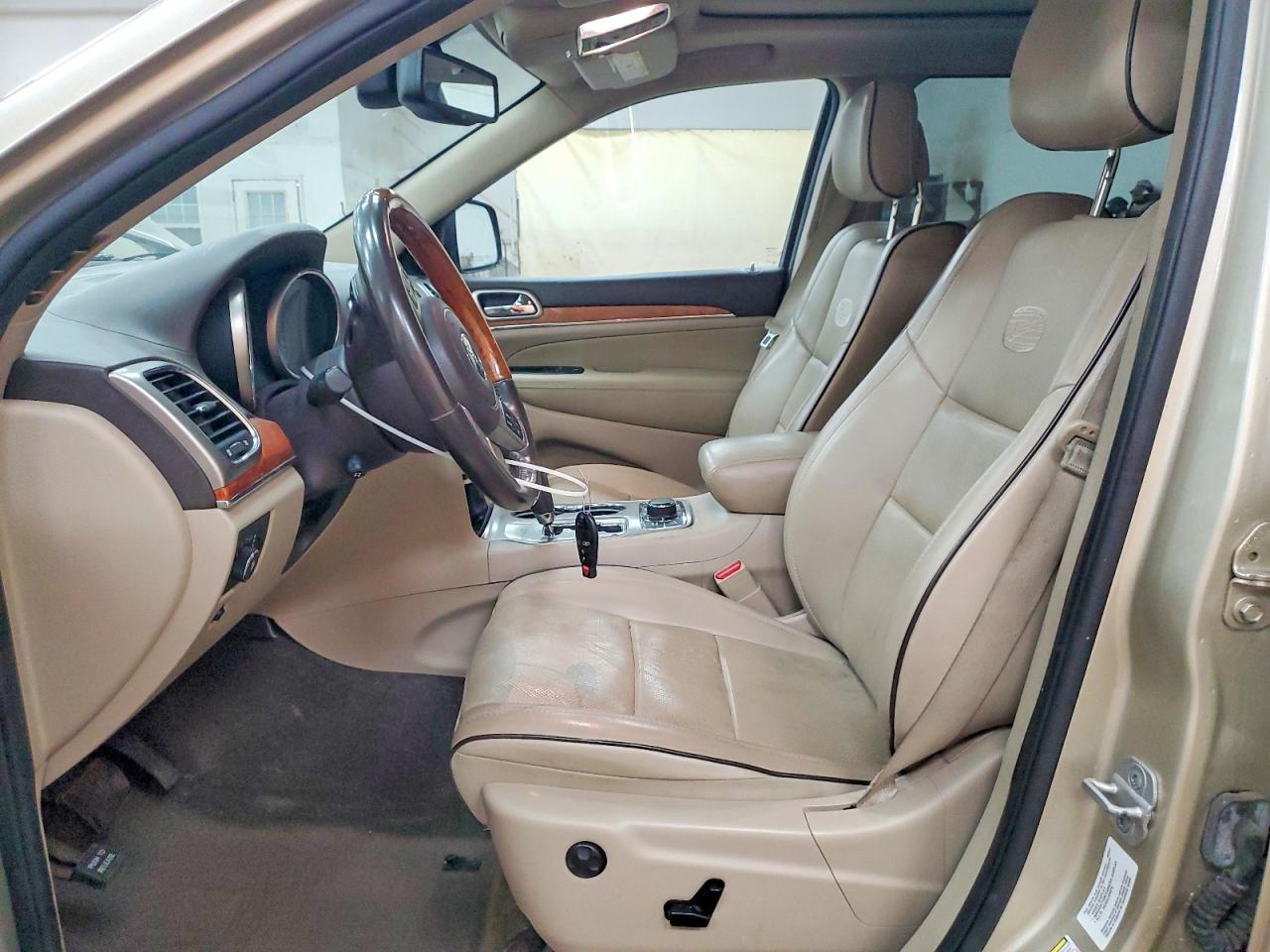 2011 Jeep Grand Cherokee Overland Золотой vin: 1J4RR6GG9BC557942