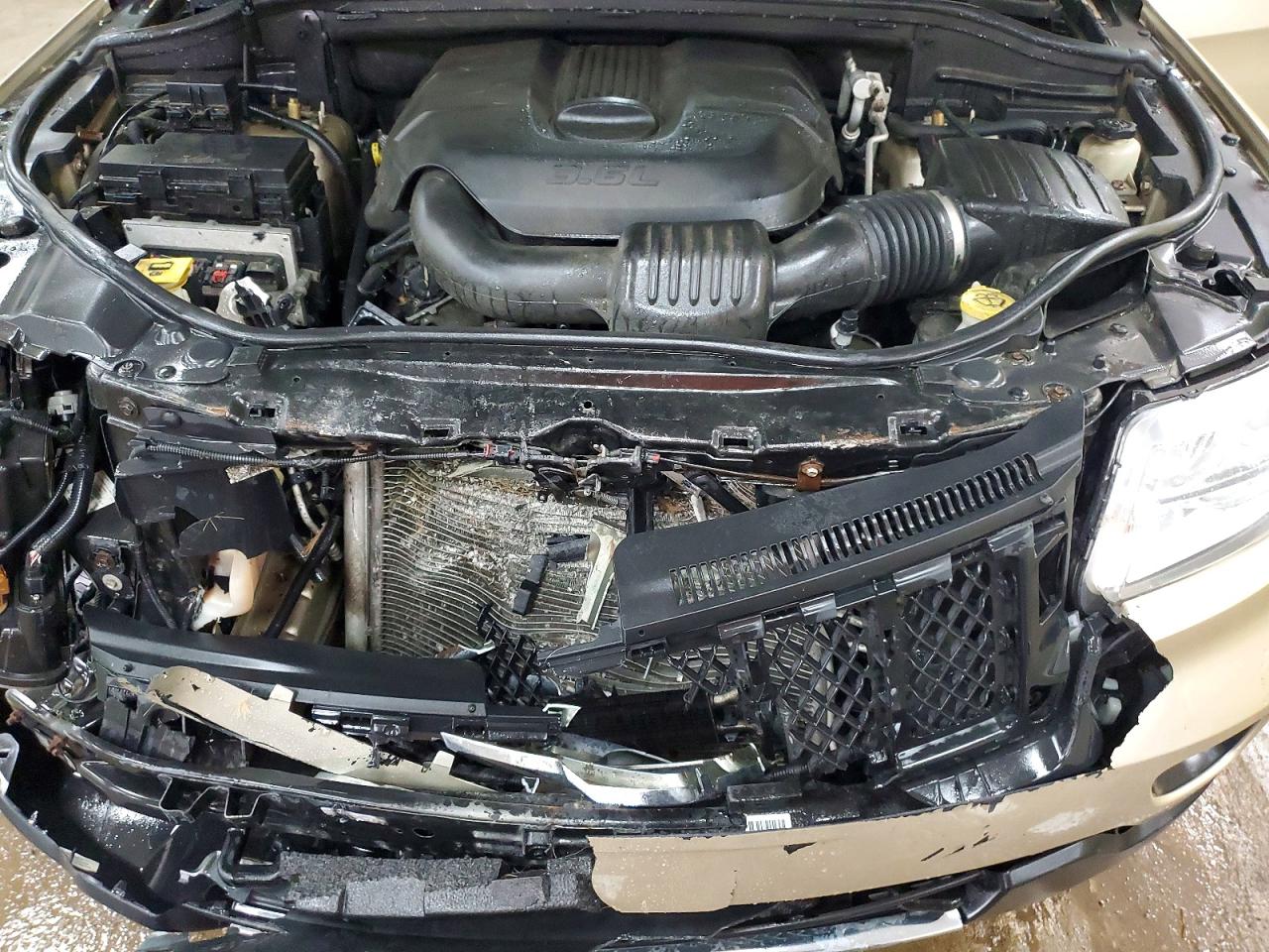 2011 Jeep Grand Cherokee Overland Золотой vin: 1J4RR6GG9BC557942