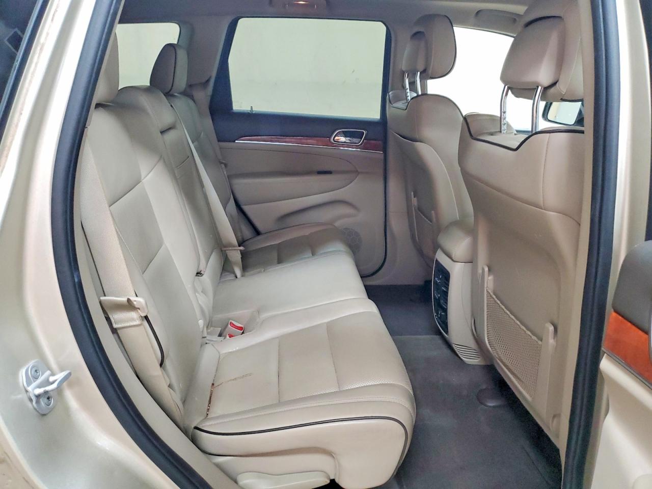 2011 Jeep Grand Cherokee Overland Золотой vin: 1J4RR6GG9BC557942