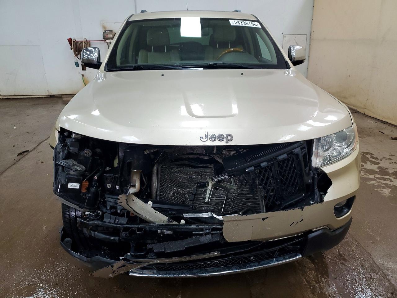 2011 Jeep Grand Cherokee Overland Золотой vin: 1J4RR6GG9BC557942