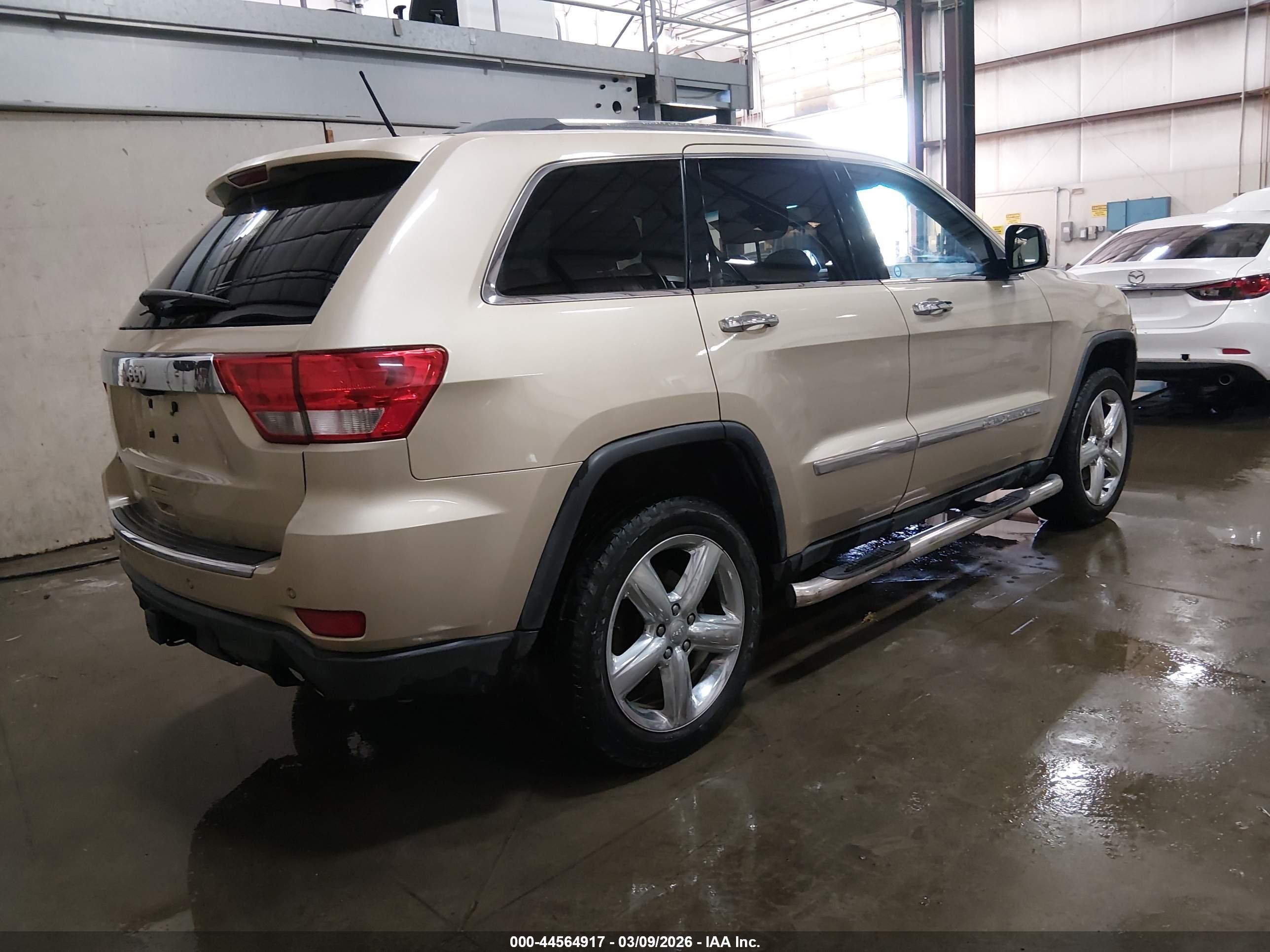 2011 Jeep Grand Cherokee Overland Tan vin: 1J4RR6GG9BC636303