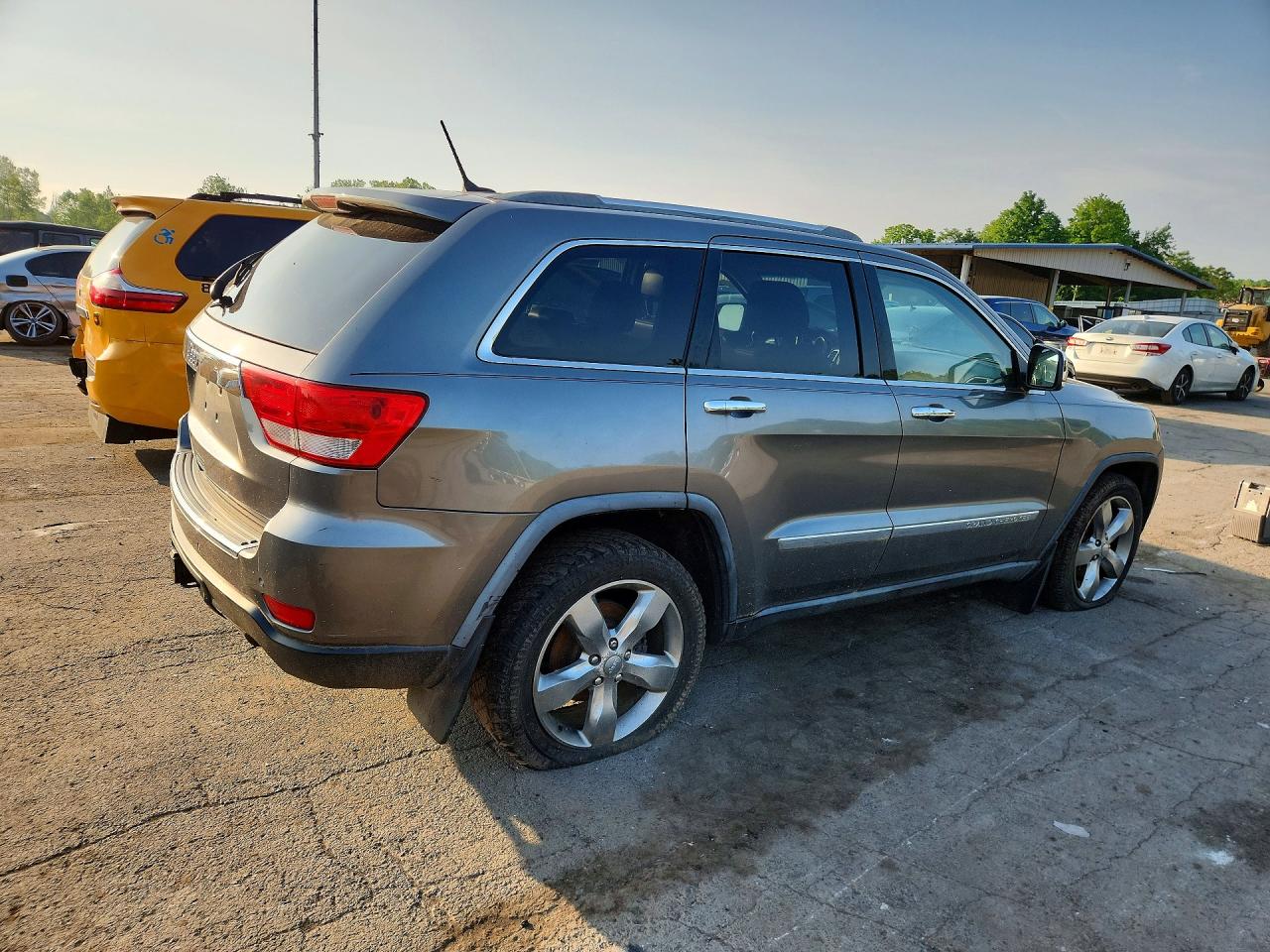 2011 Jeep Grand Cherokee Overland Серебряный vin: 1J4RR6GG9BC744310