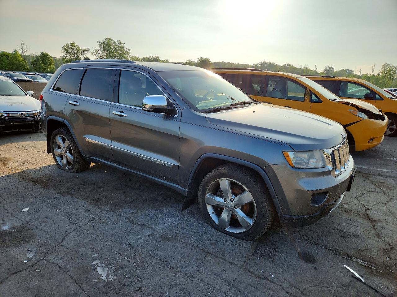 2011 Jeep Grand Cherokee Overland Серебряный vin: 1J4RR6GG9BC744310