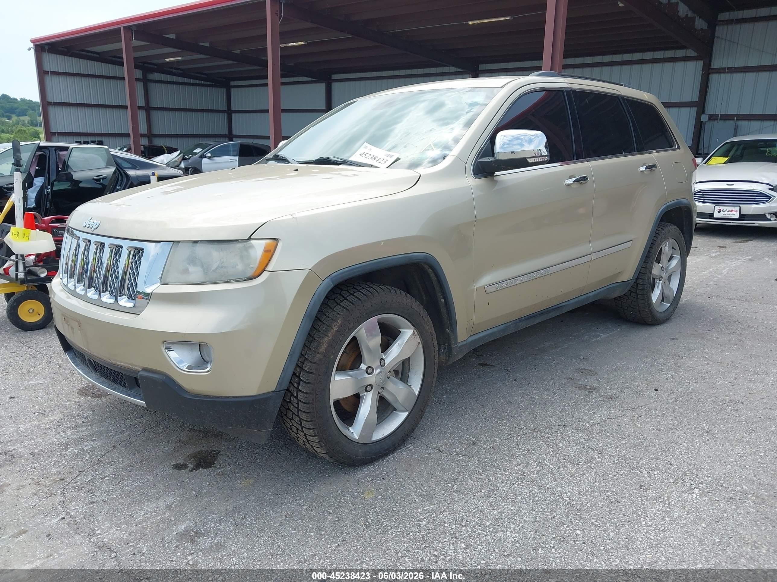 2011 Jeep Grand Cherokee Overland Золотой vin: 1J4RR6GT0BC620973