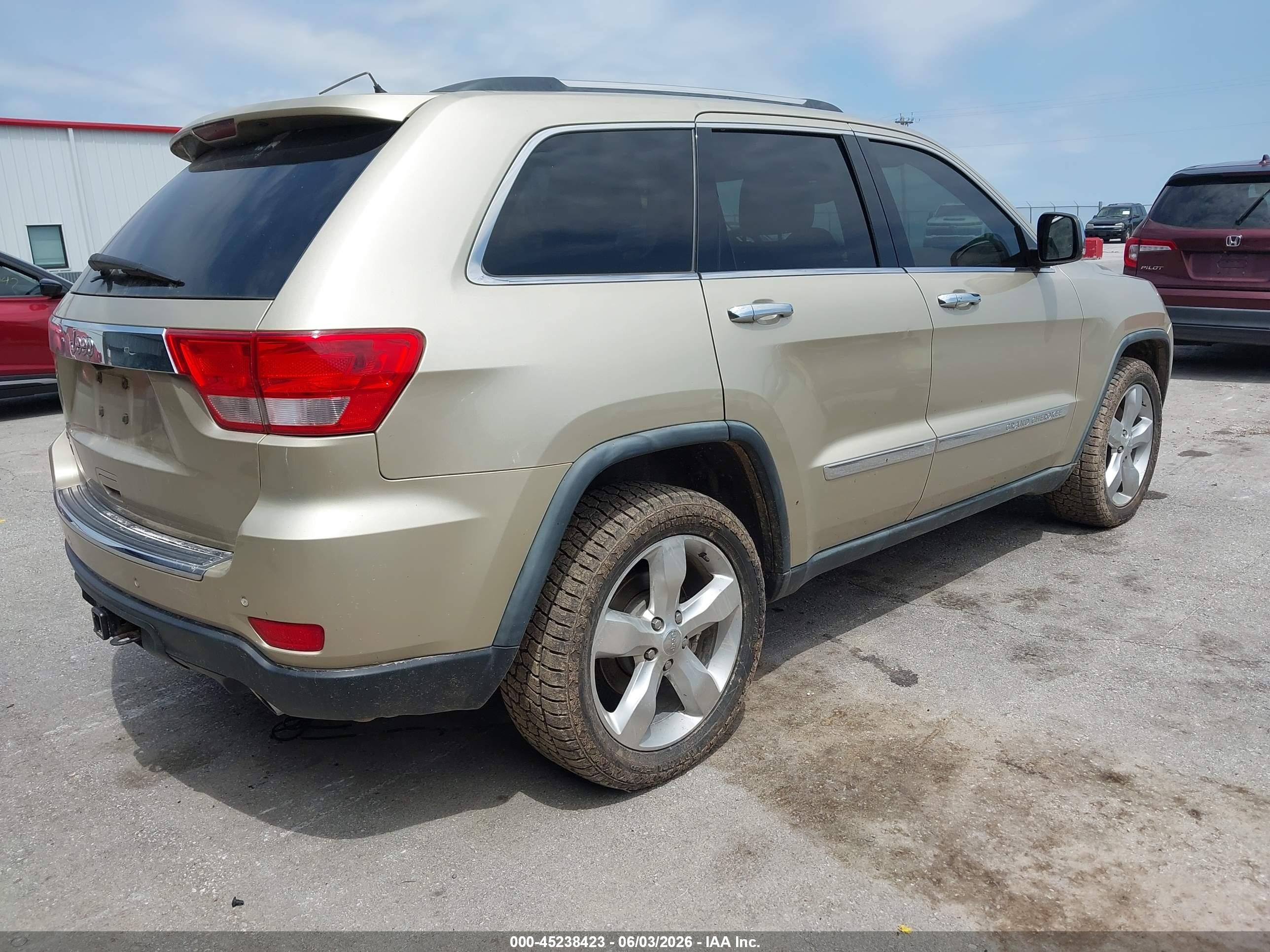2011 Jeep Grand Cherokee Overland Золотой vin: 1J4RR6GT0BC620973