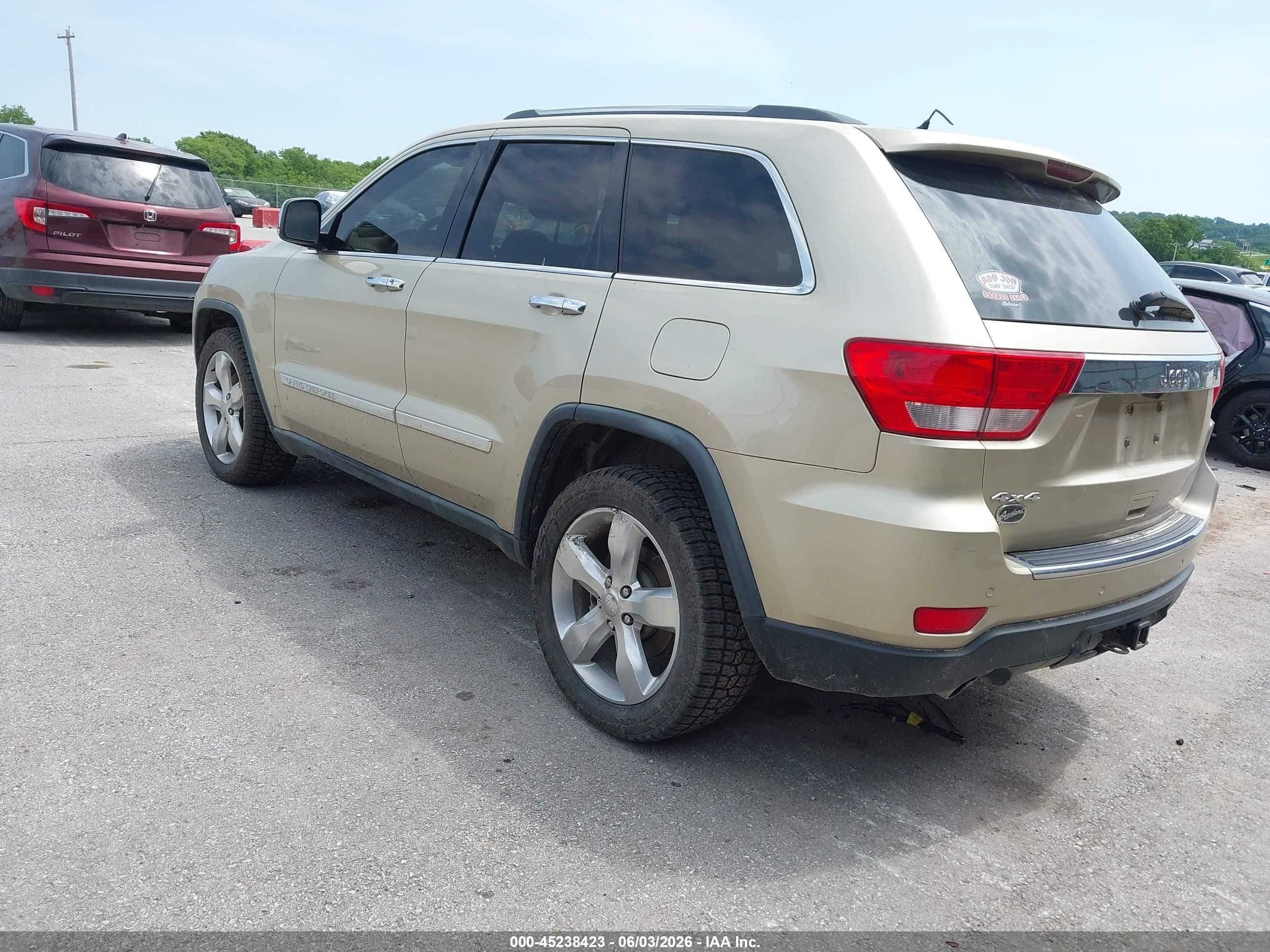2011 Jeep Grand Cherokee Overland Золотой vin: 1J4RR6GT0BC620973