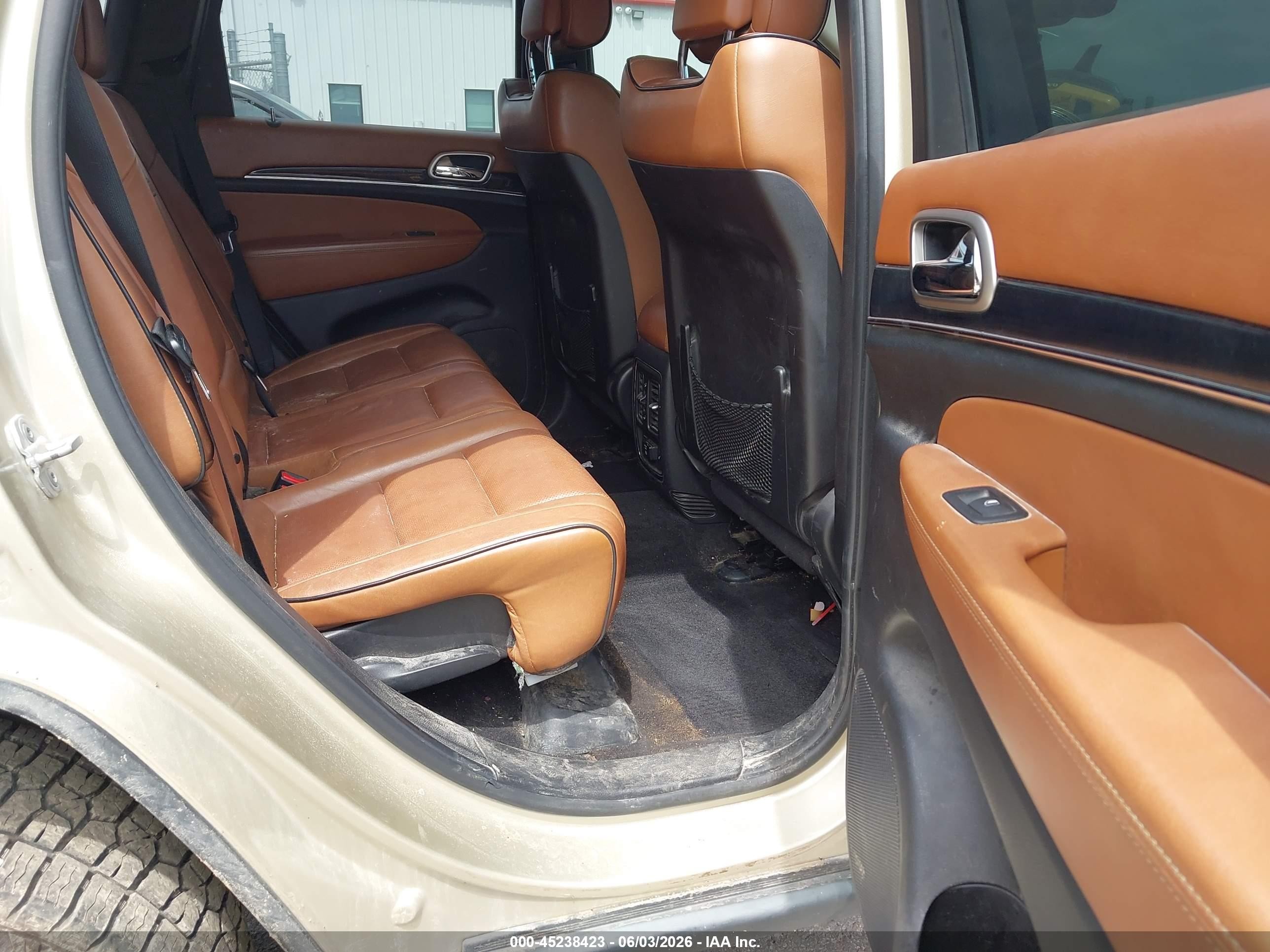2011 Jeep Grand Cherokee Overland Золотой vin: 1J4RR6GT0BC620973