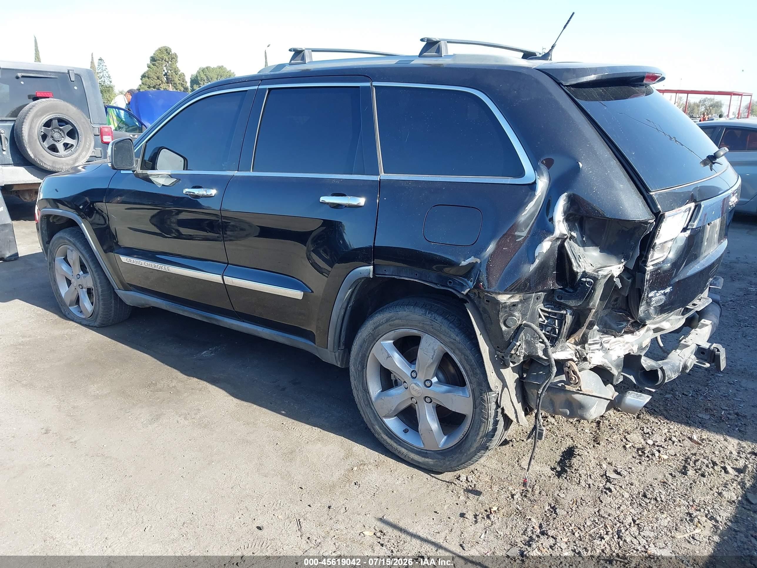 2011 Jeep Grand Cherokee Overland Black vin: 1J4RR6GT2BC635765