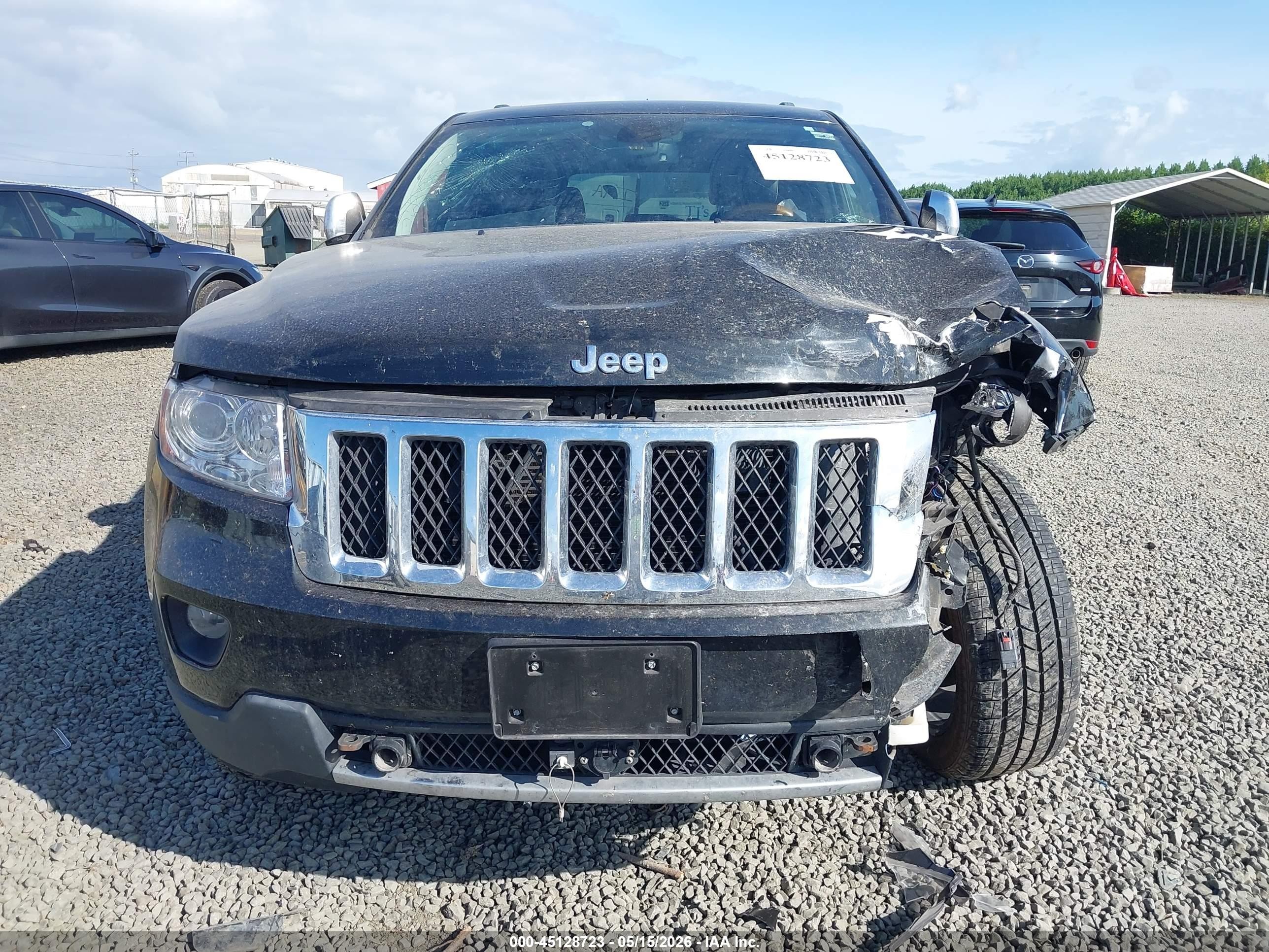 2011 Jeep Grand Cherokee Overland Black vin: 1J4RR6GT7BC665148