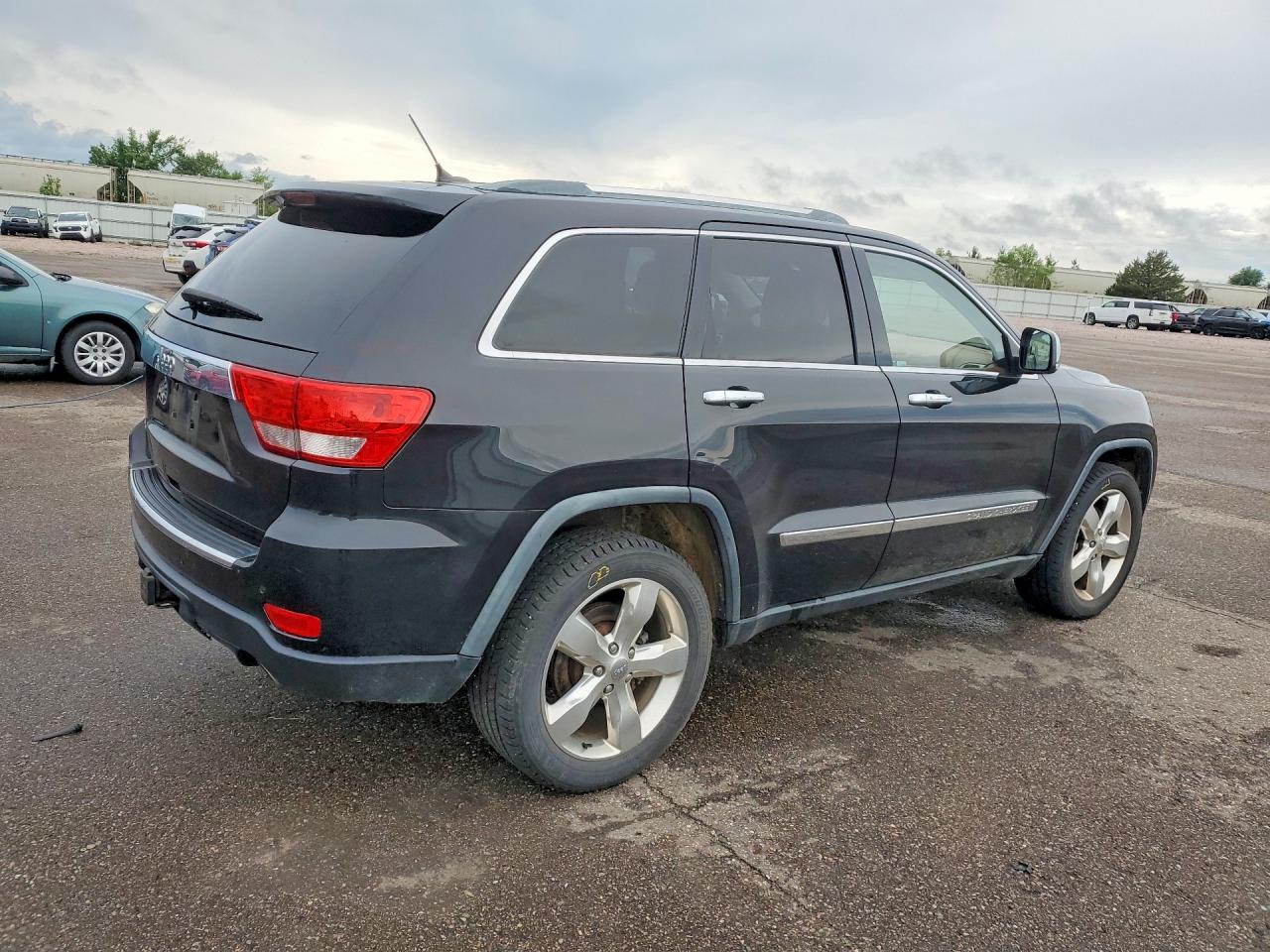 2011 Jeep Grand Cherokee Overland Black vin: 1J4RR6GTXBC646982