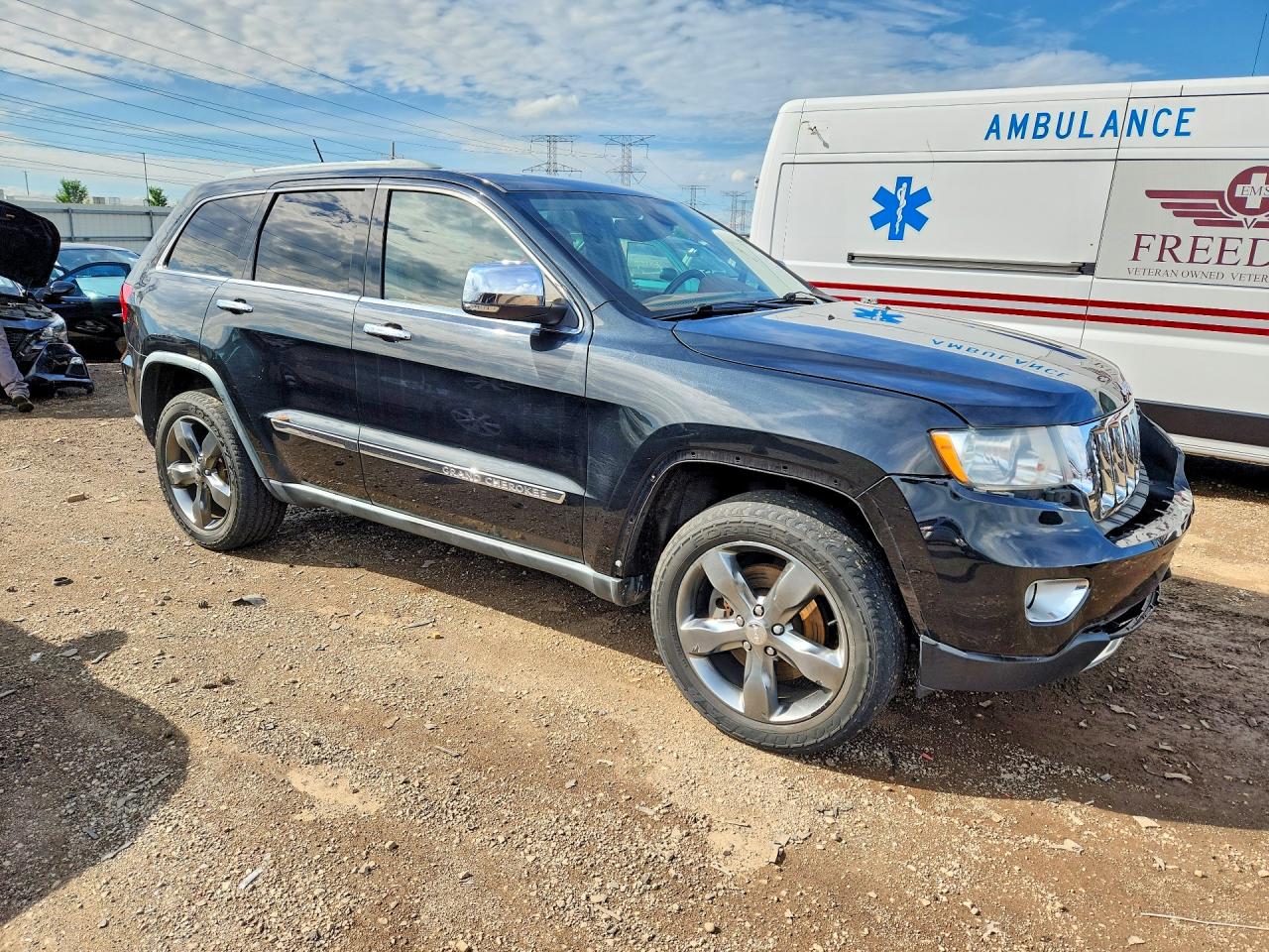 2011 Jeep Grand Cherokee Overland Black vin: 1J4RR6GTXBC684499