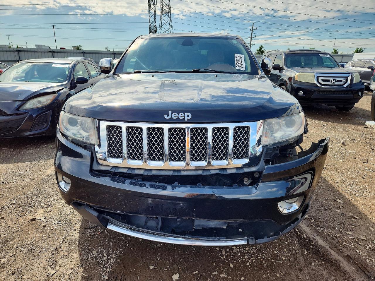 2011 Jeep Grand Cherokee Overland Black vin: 1J4RR6GTXBC684499