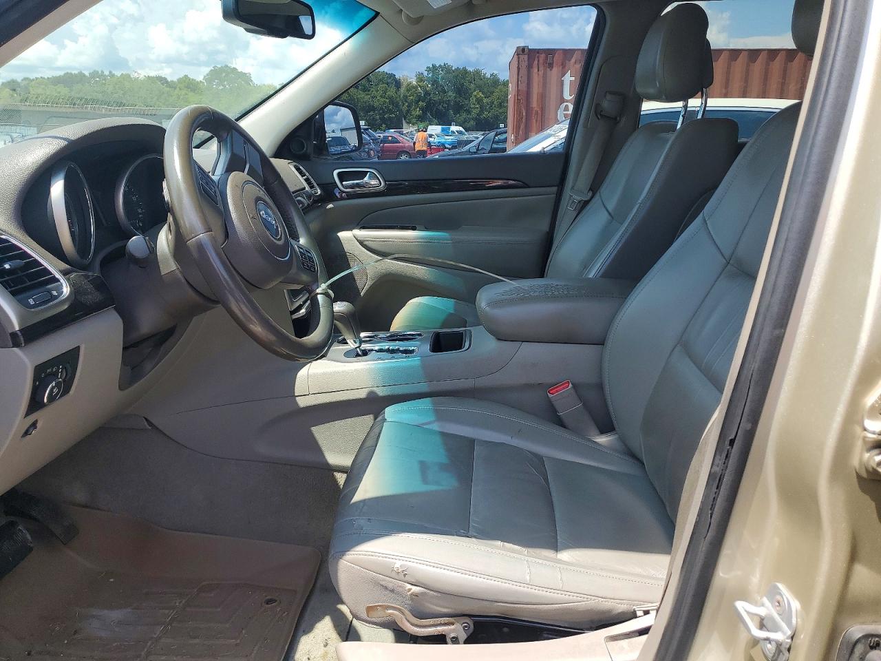 2011 Jeep Grand Cherokee Laredo Желто-коричневый vin: 1J4RS4GG5BC558711