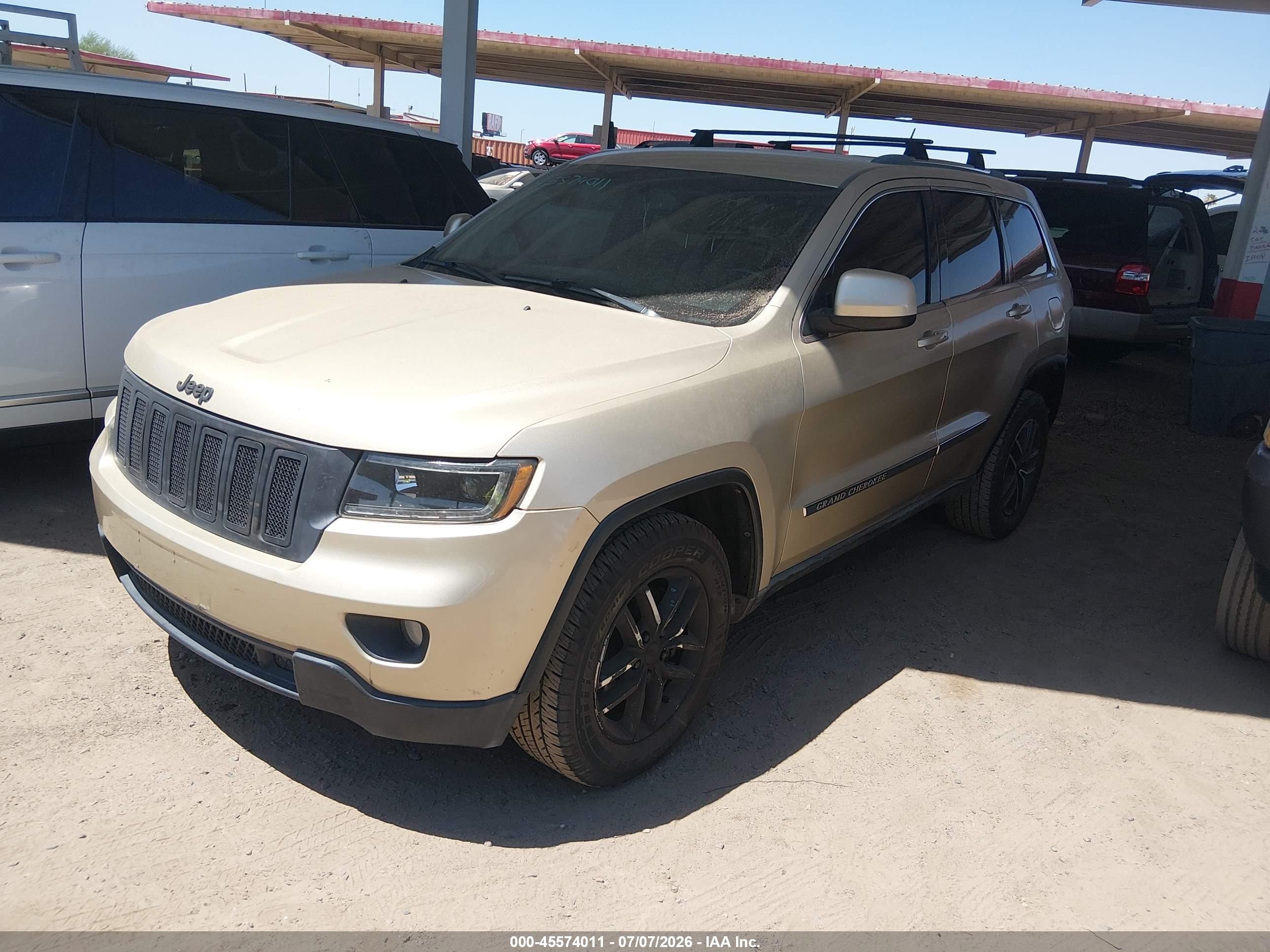 2011 Jeep Grand Cherokee Laredo Beige vin: 1J4RS4GG5BC672255
