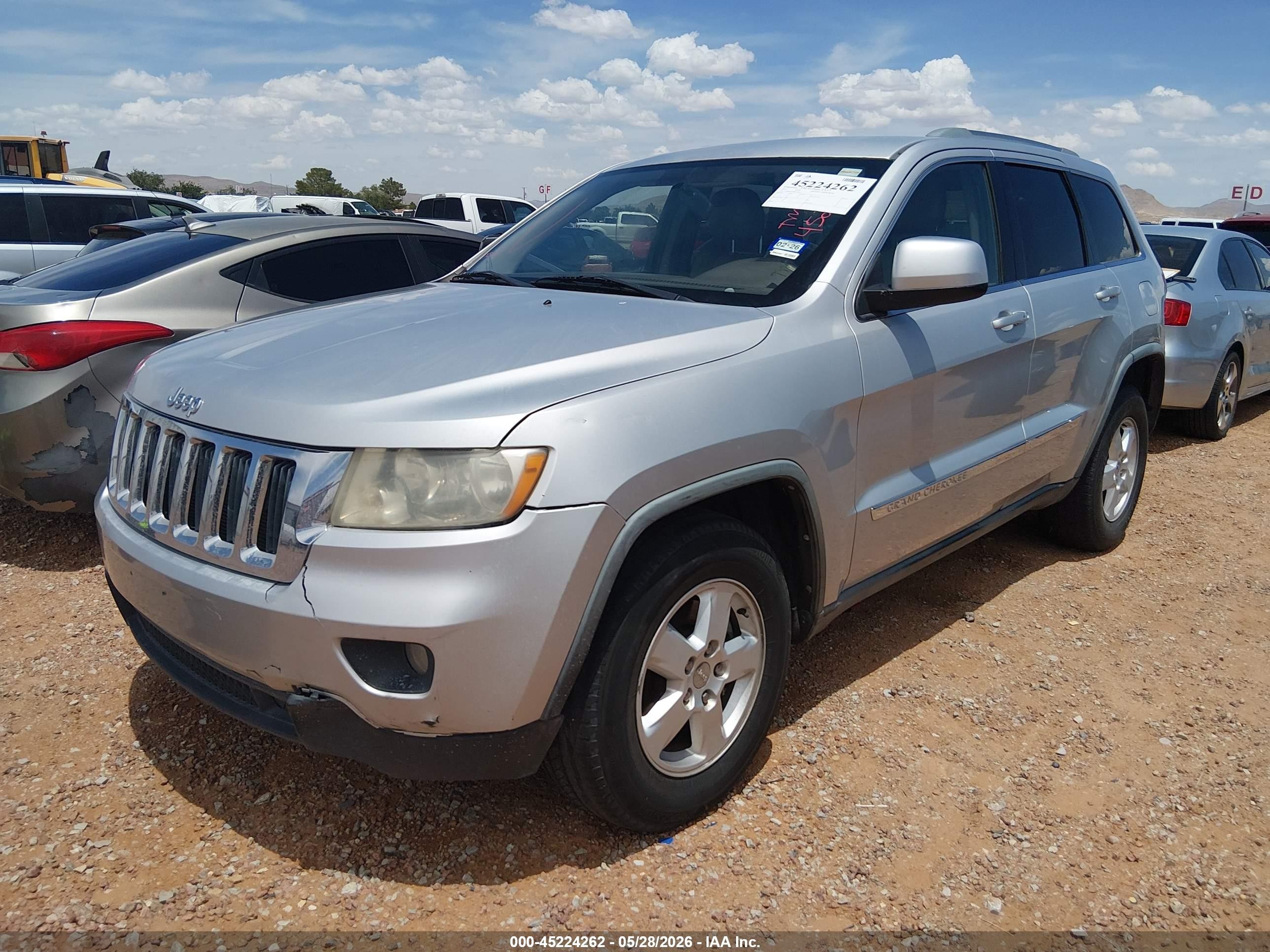 2011 Jeep Grand Cherokee Laredo Серебряный vin: 1J4RS4GG9BC618022