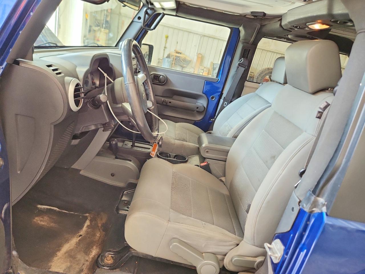 2009 Jeep Wrangler Sahara Blue vin: 1J8FA54189L788375