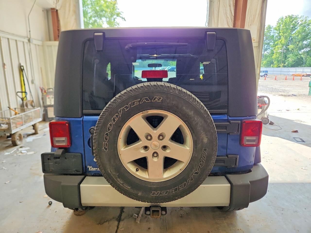 2009 Jeep Wrangler Sahara Blue vin: 1J8FA54189L788375