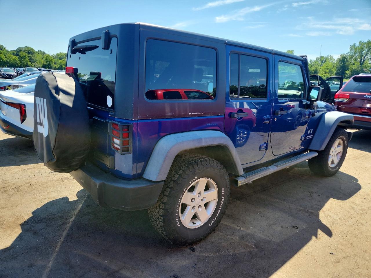 2009 Jeep Wrangler Unlimited X Blue vin: 1J8GA39159L729558