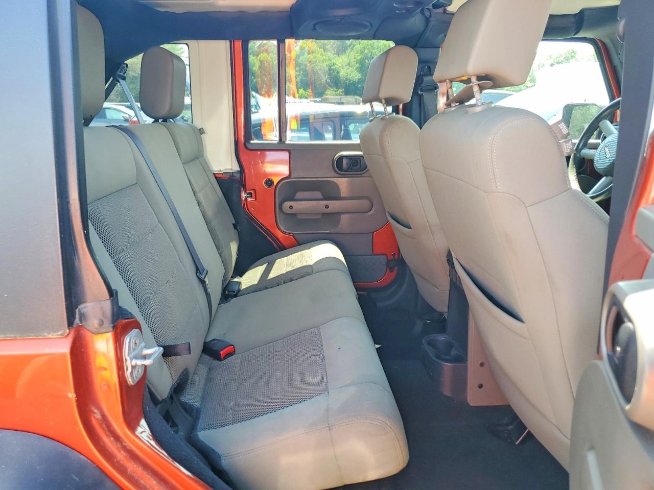 2009 Jeep Wrangler Unlimited Sahara Orange vin: 1J8GA59149L711158