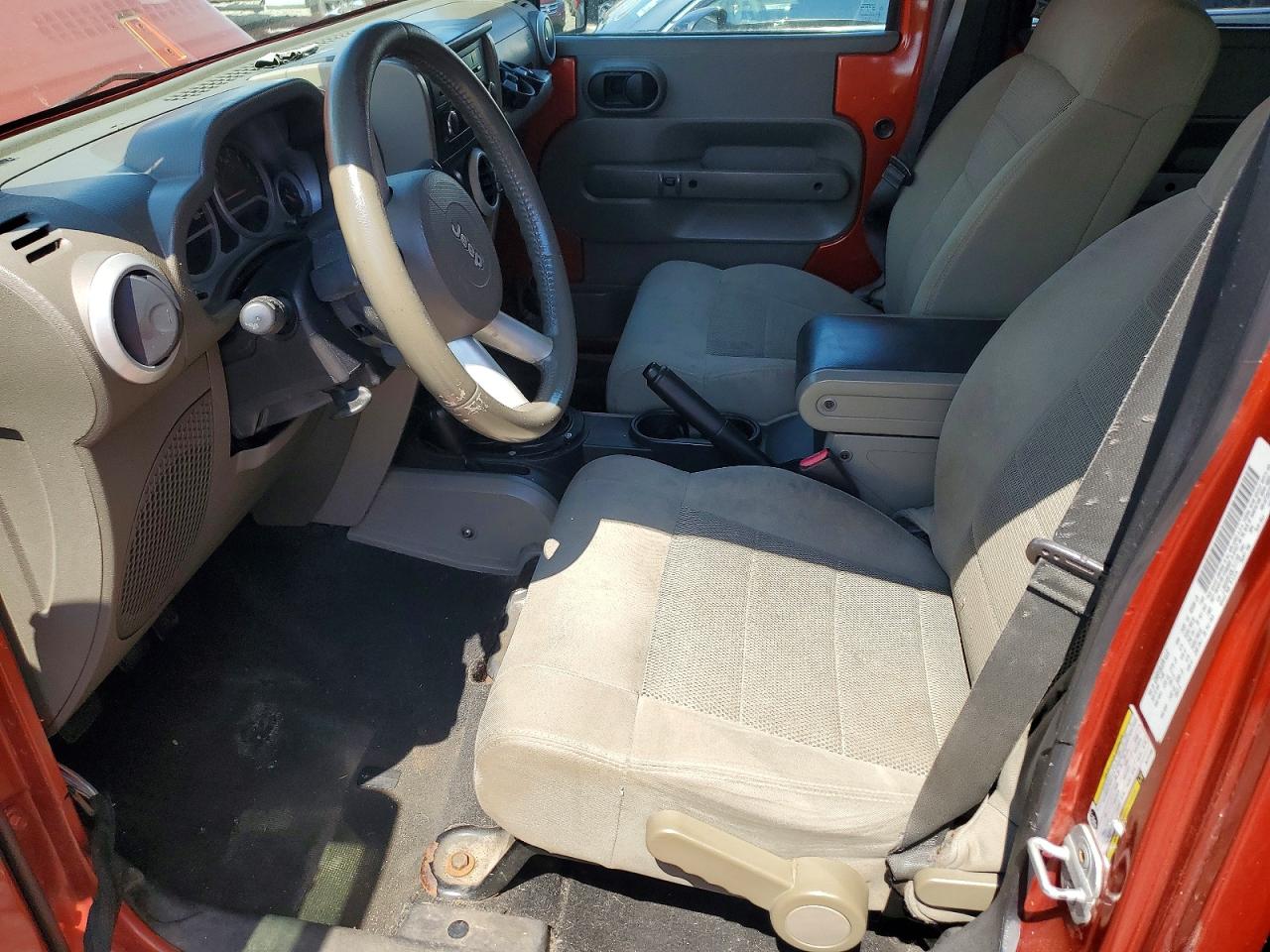 2009 Jeep Wrangler Unlimited Sahara Orange vin: 1J8GA59149L711158