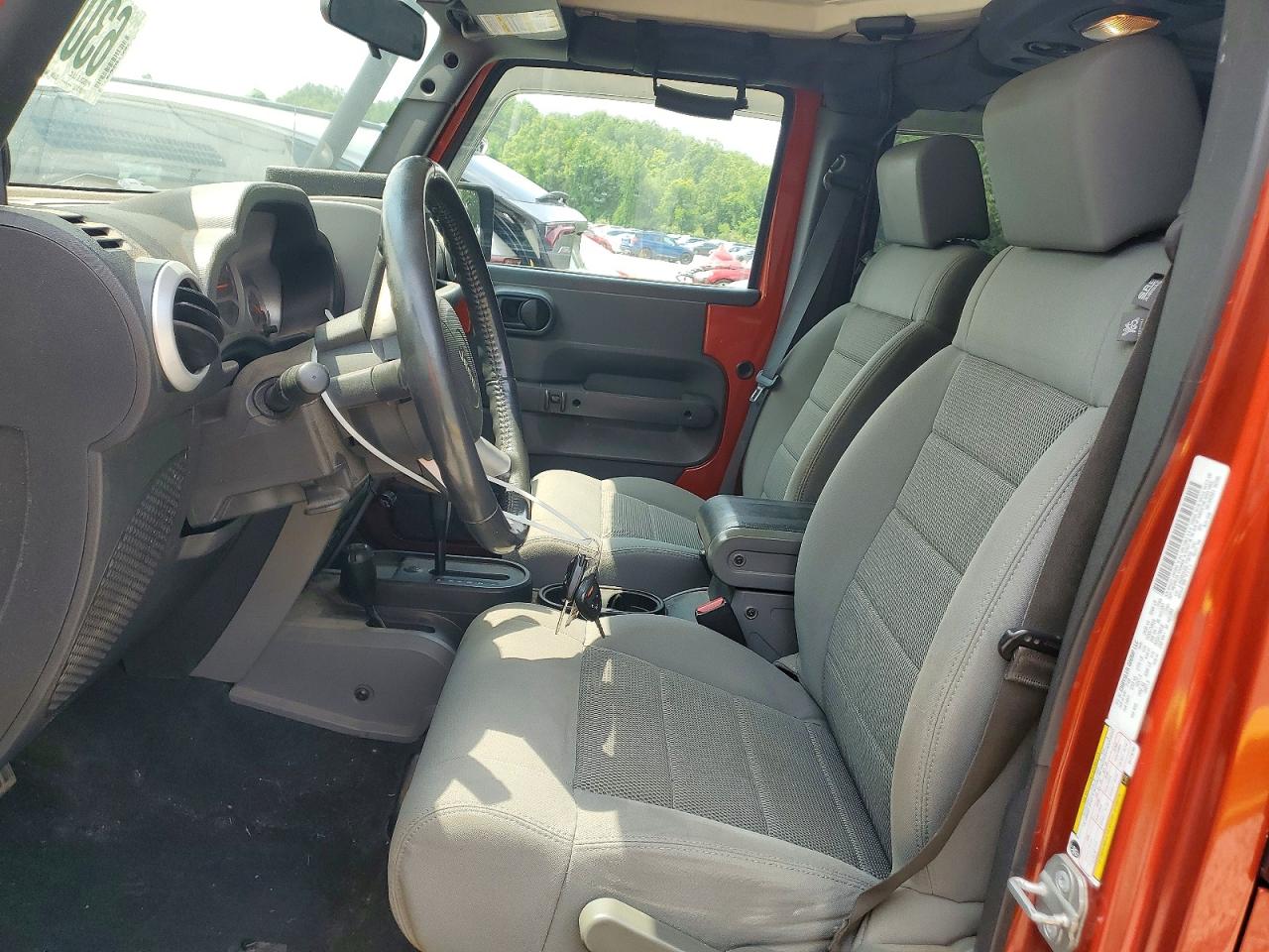 2009 Jeep Wrangler Unlimited Sahara Orange vin: 1J8GA59189L778796