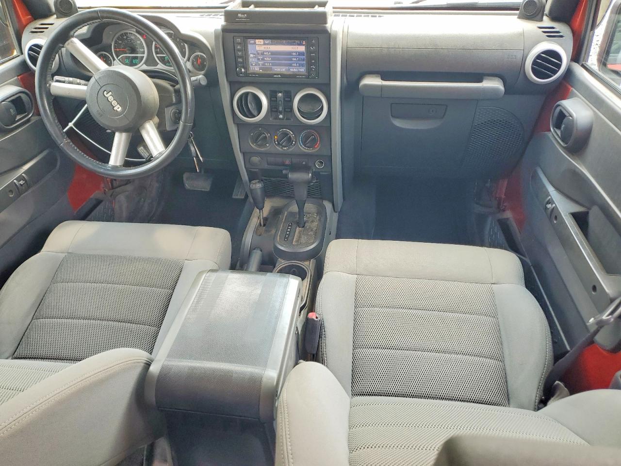 2009 Jeep Wrangler Unlimited Sahara Orange vin: 1J8GA59189L778796