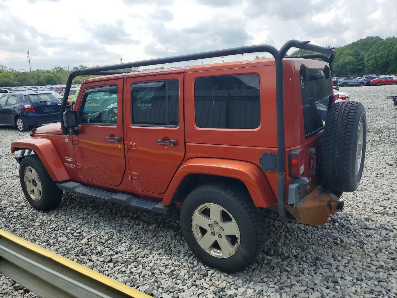 2009 Jeep Wrangler Unlimited Sahara Orange vin: 1J8GA59189L778796