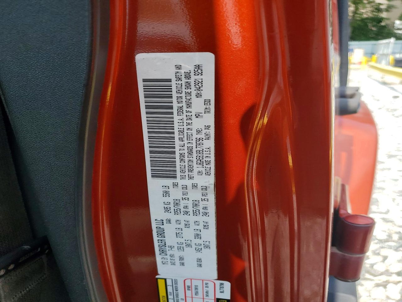 2009 Jeep Wrangler Unlimited Sahara Orange vin: 1J8GA59189L778796