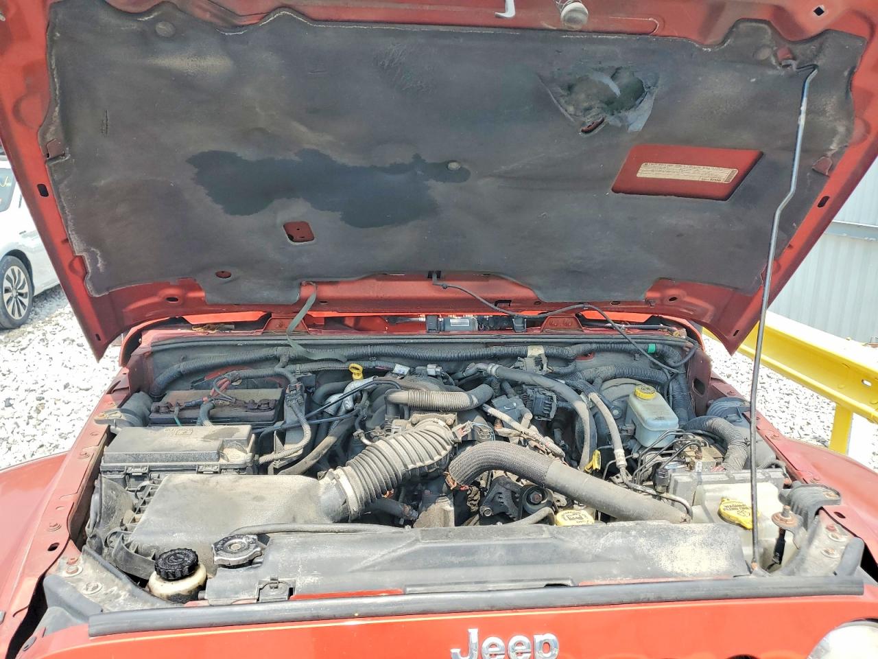 2009 Jeep Wrangler Unlimited Sahara Orange vin: 1J8GA59189L778796