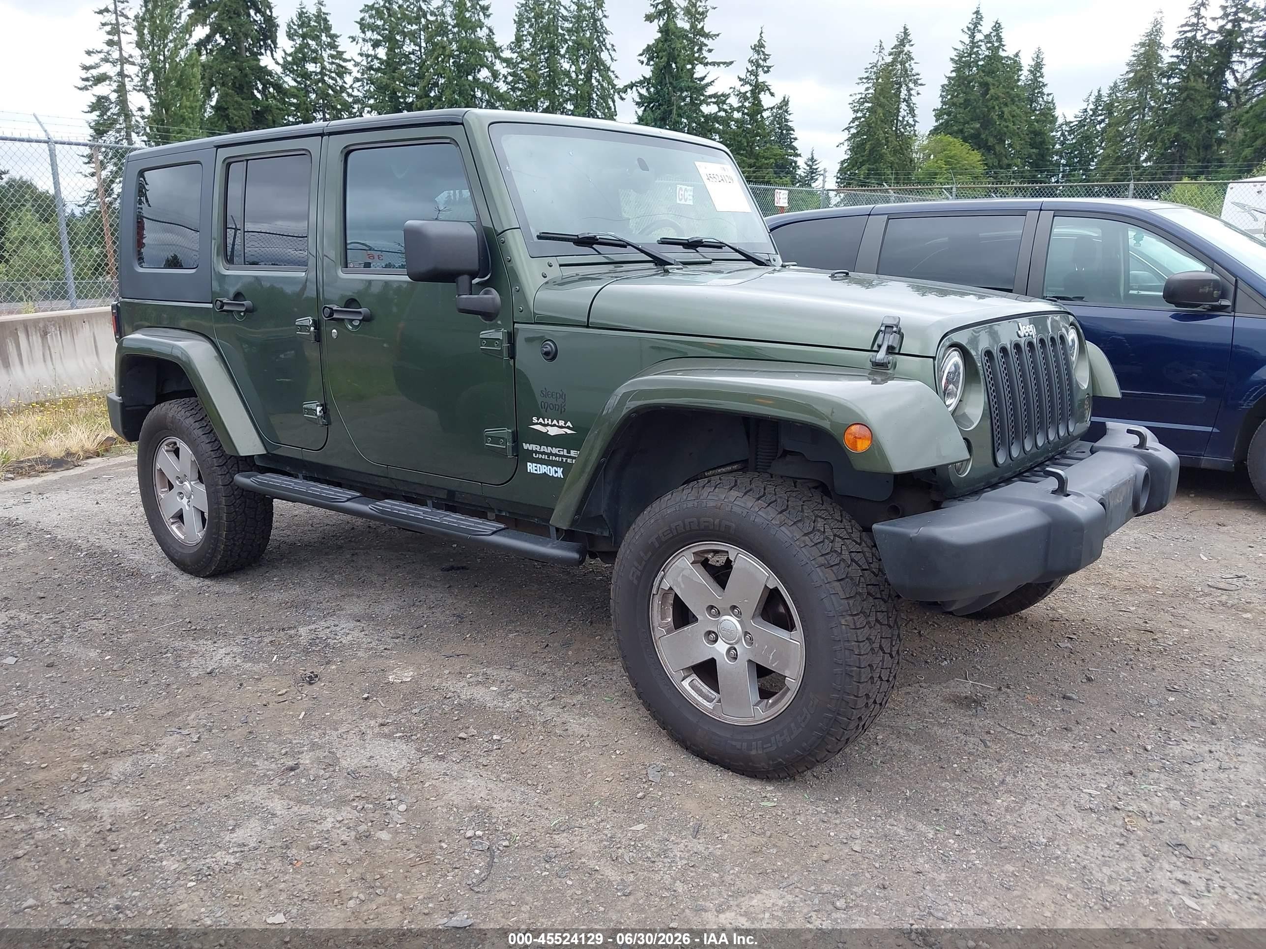 2007 Jeep Wrangler Unlimited Sahara Green vin: 1J8GA59197L189401