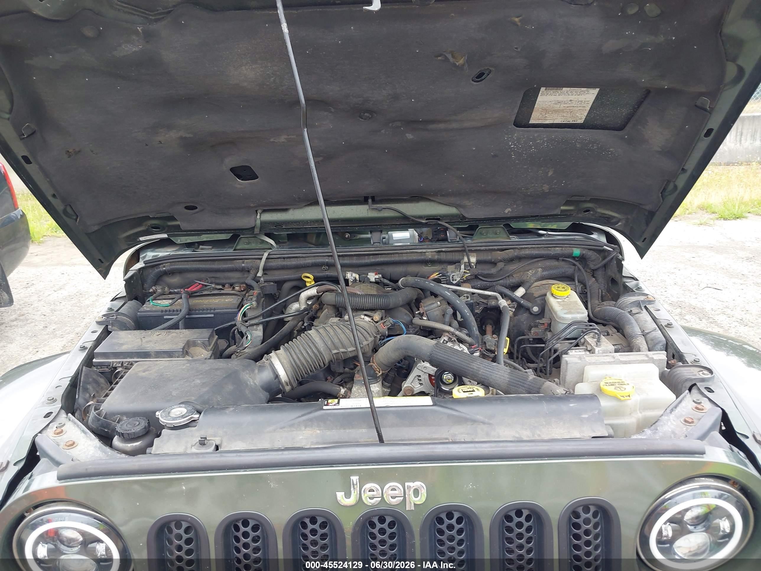 2007 Jeep Wrangler Unlimited Sahara Green vin: 1J8GA59197L189401
