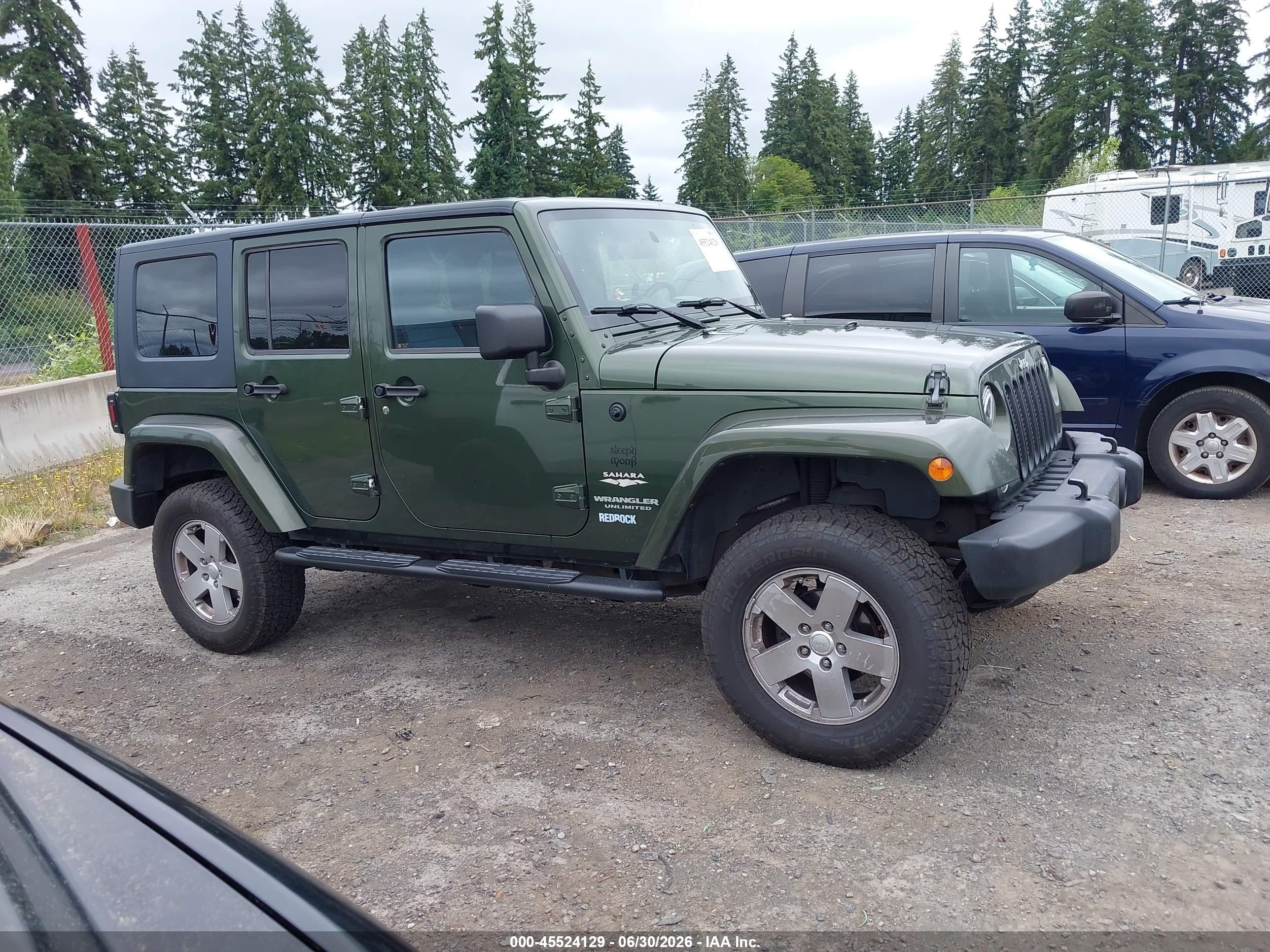 2007 Jeep Wrangler Unlimited Sahara Green vin: 1J8GA59197L189401